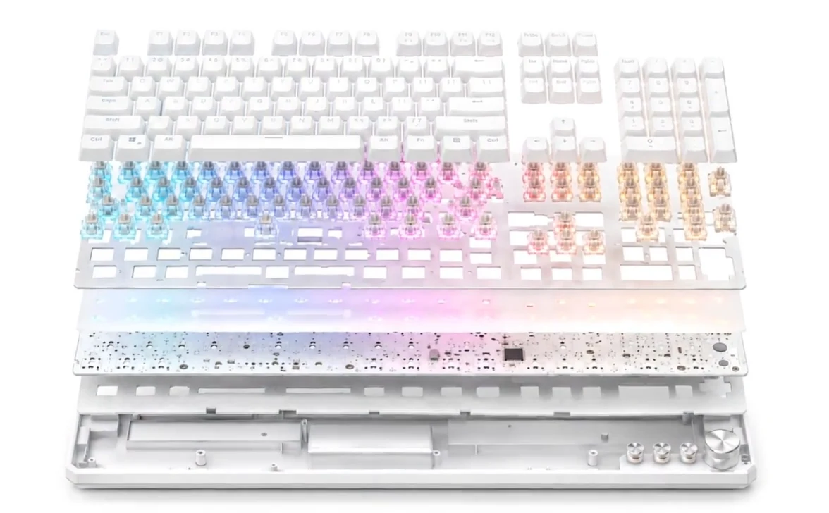The transparent RGB switch layer revealed underneath white keycaps